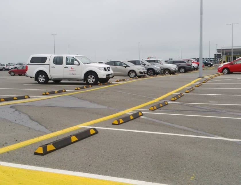 Parking Lot Wheel Stop with Yellow Stripes